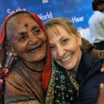 Dr. Rudden hugging Indian woman